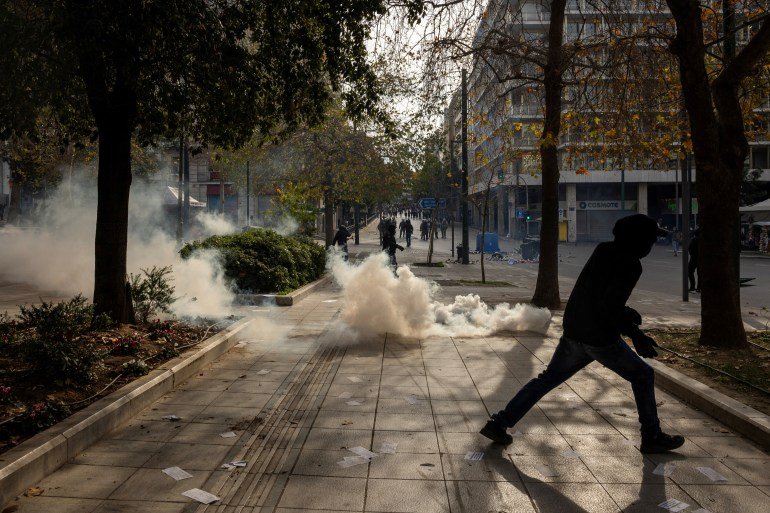 Demonstrators clash with police riots in Greece