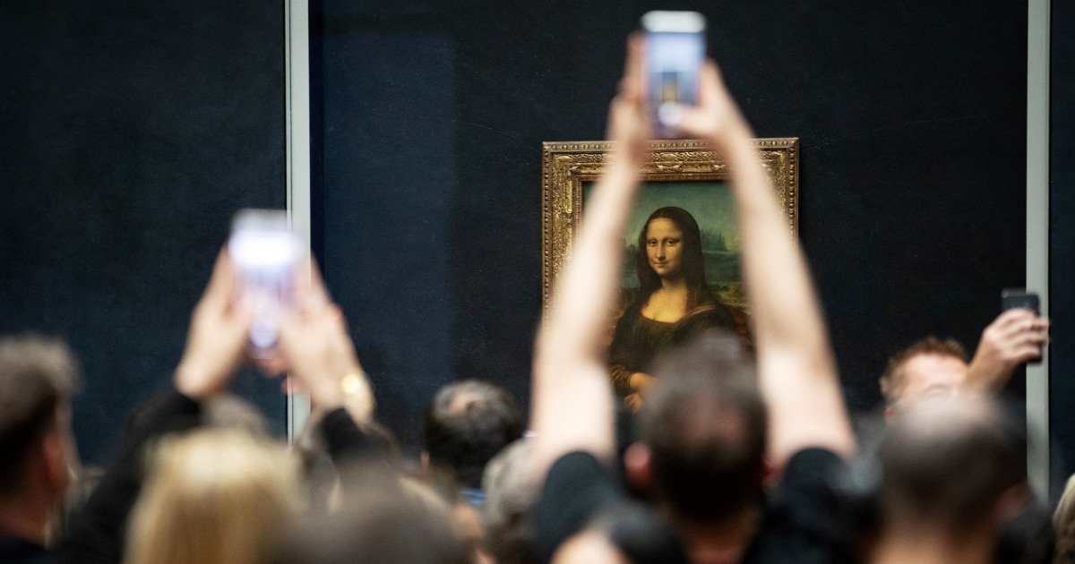 Macron visits the Louvre as reports of disrepair spur concern over the 'Mona Lisa'