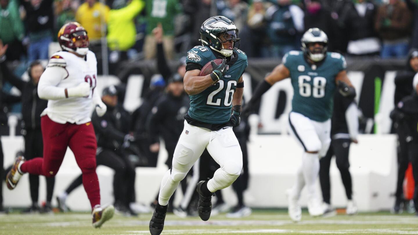 Eagles' Saquon Barkley shines in 1st half of NFC title game with TD runs of 60, 4 yards