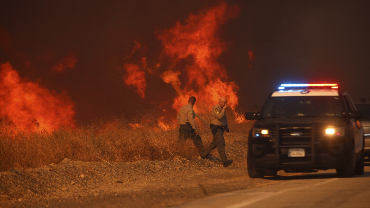 Firefighters battle to maintain the upper hand on a huge fire north of Los Angeles