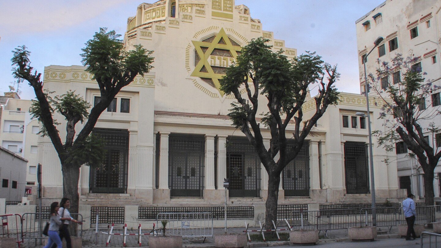 Police kill a man who set himself on fire outside a Tunisian synagogue