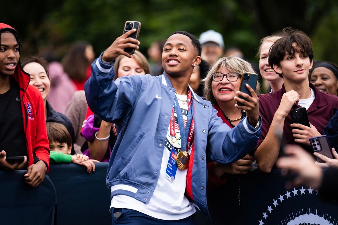 Wilson takes photos with fans during a visit to the White House on September 30.