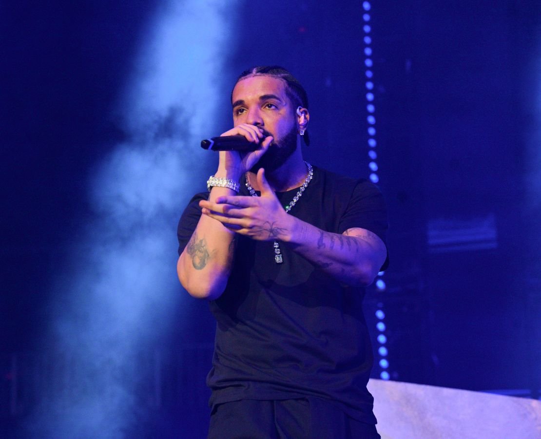 Raper performs stage during Drake 