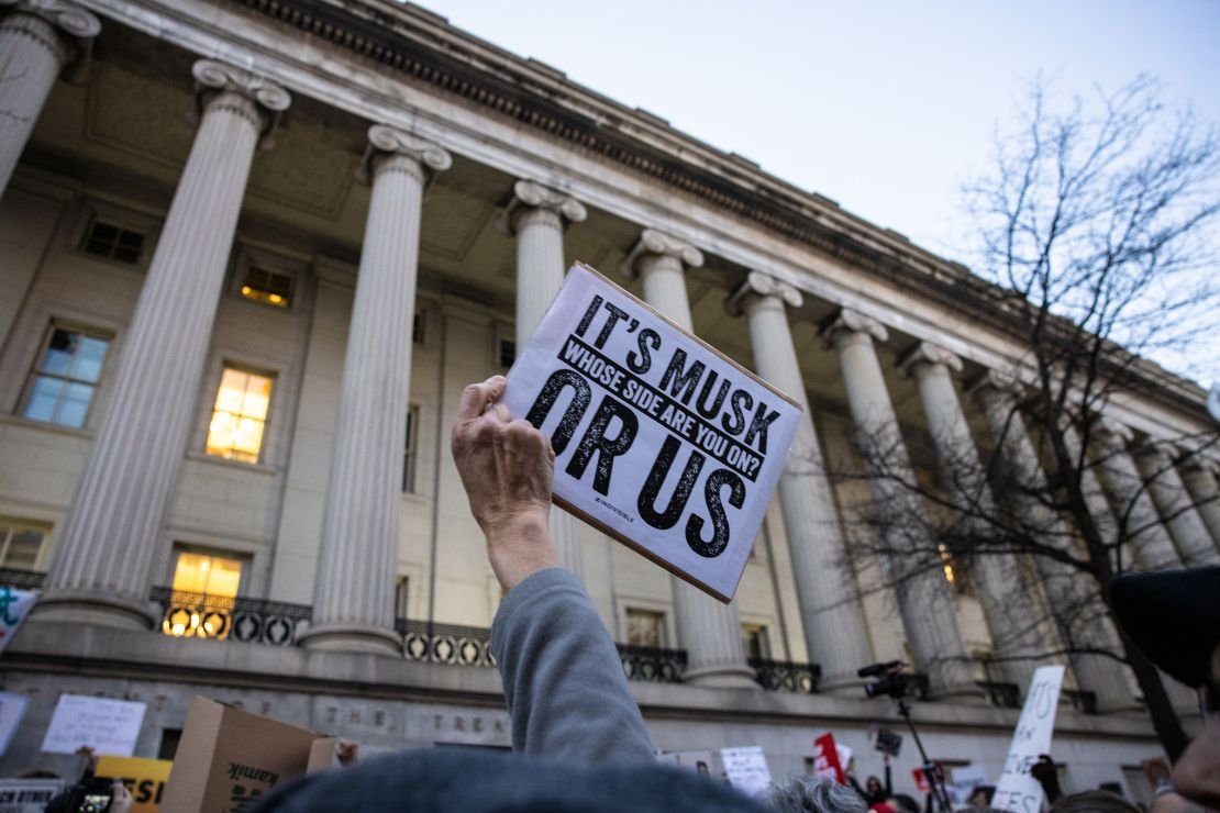 On February 4, 2025, in front of the US Department of Treasury, a protesters made a mark during a rally in protest of the performance of Elon Musk and the government.