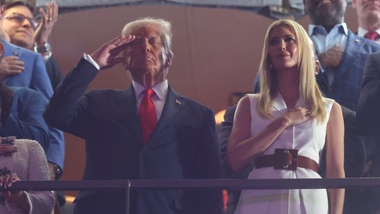 President Trump, along with his daughter Ivanka, was in the picture, giving salute during the national anthem. Photo: Reuters