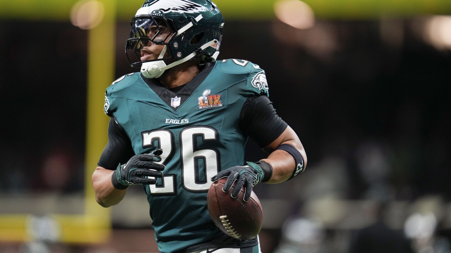 Eagles running back Saquon Barkley sets the NFL's season rushing record, including the playoffs