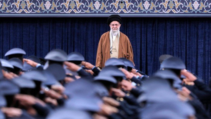 Ayatollah Ali Khamenei stands before members of Iran’s air force in Tehran