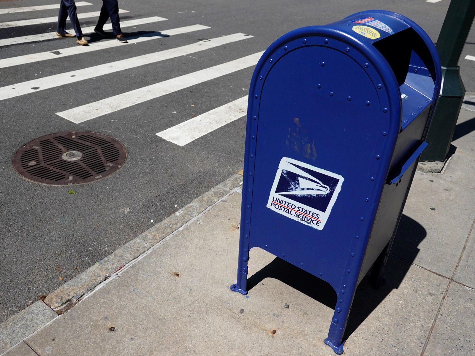 US Postal Service will accept packages from China, Hong Kong after freeze | Business and Economy News