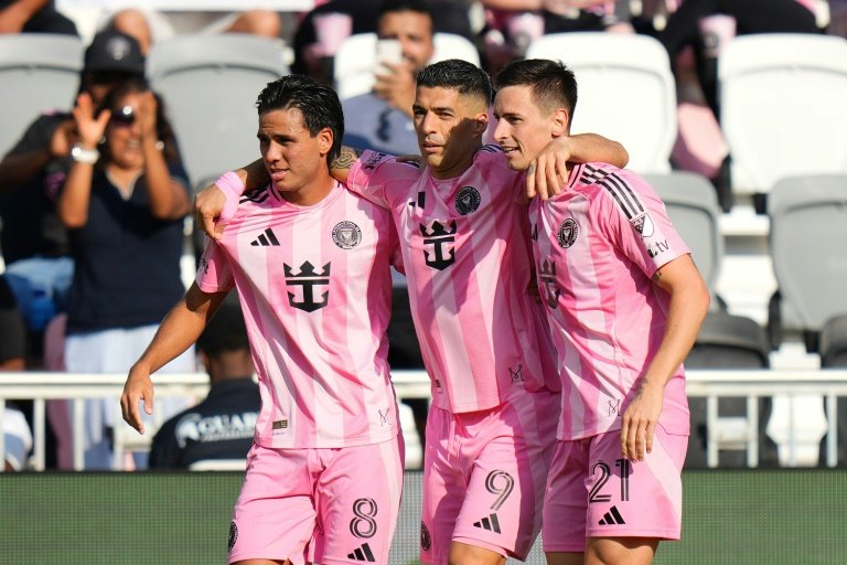 Tadeo Allende #21 of Inter Miami celebrates with teammates Luis Suárez #9 and Telasco Segovia #8 after scoring in the 1-0 win over Charlotte in MLS on Sunday. (Rich Storry)