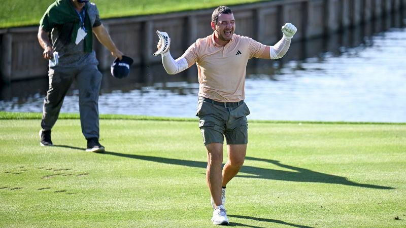 Alejandro Tosti jumps in water at The Players Championship after making hole-in-one