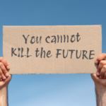 A protest sign that says You Cannot Kill the Future