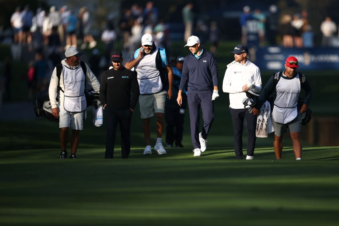 The three American Clark (left), Speth (Center) and Walker (right) walk on the tenth fair during the first round.