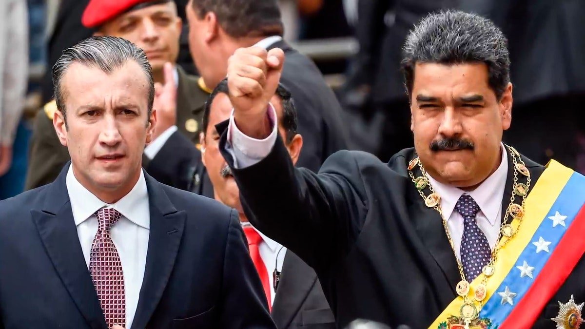 Maduro holds his fist