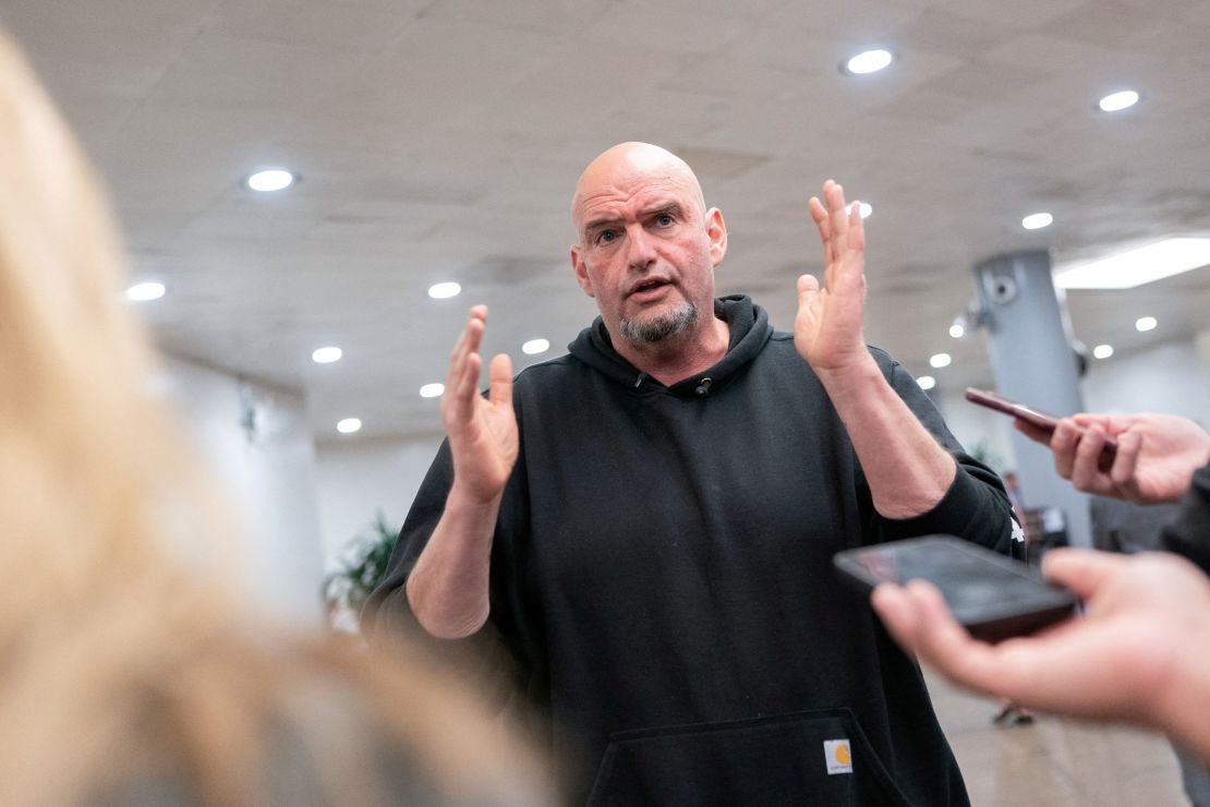 San John Fitter talks with media members in the US capital of Washington DC on March 12, 2025.