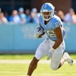 Denver Broncos select UNC RB Omarion Hampton